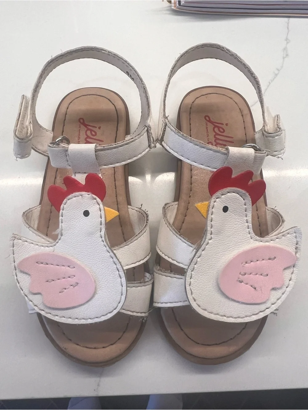 Jellypop White Chicken Sandals with Pink Wings
